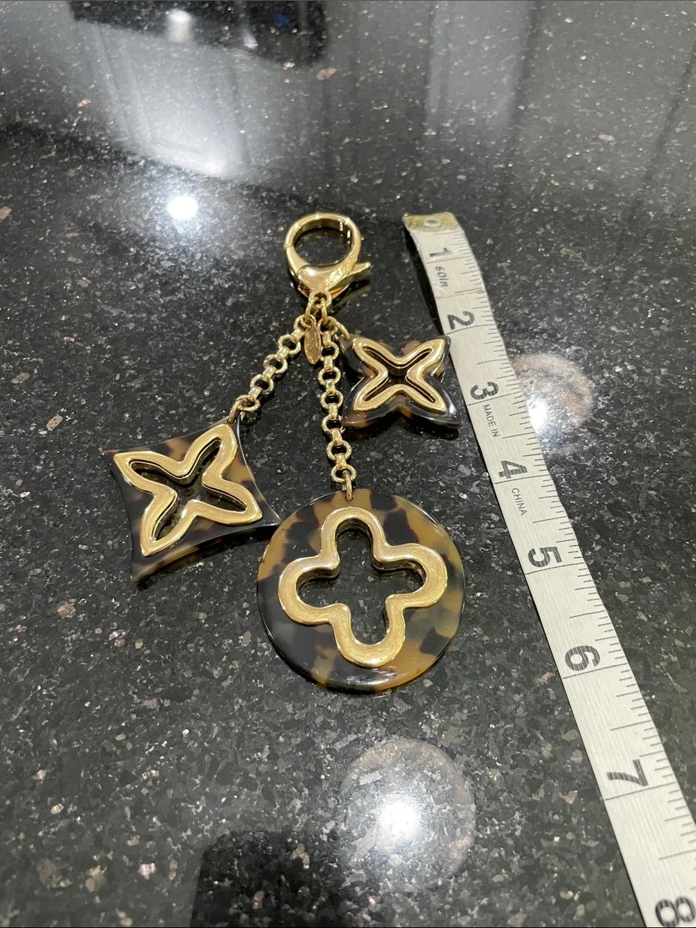 Louis Vuitton Insolence Bag Charm Metal and Tortoise Brown, Gold
